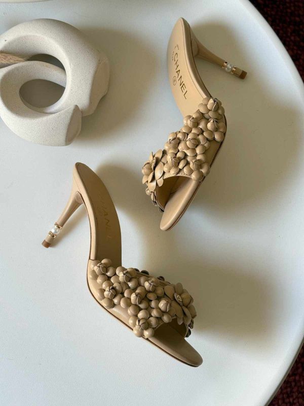 chanel camellia nude pumps