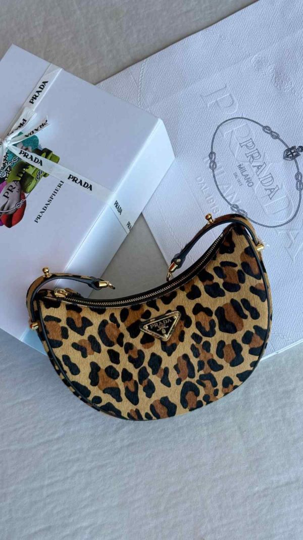 Prada leopard print half moon shoulder bag