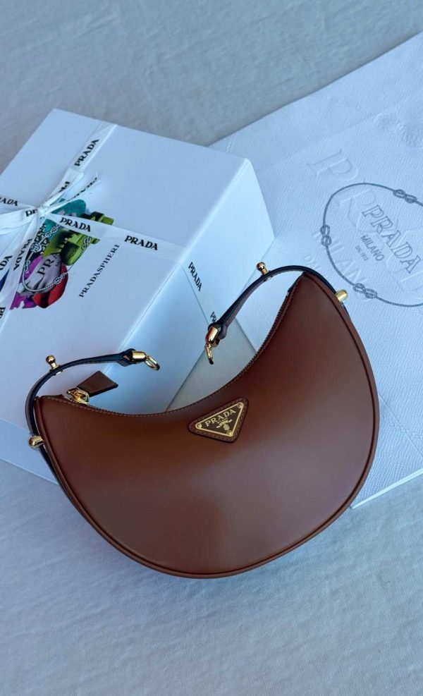 Prada genuine leather half moon shoulder bag brown