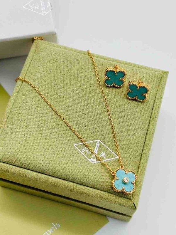 Van Cleef & Arpels Clover earrings and pendant baby blue colour