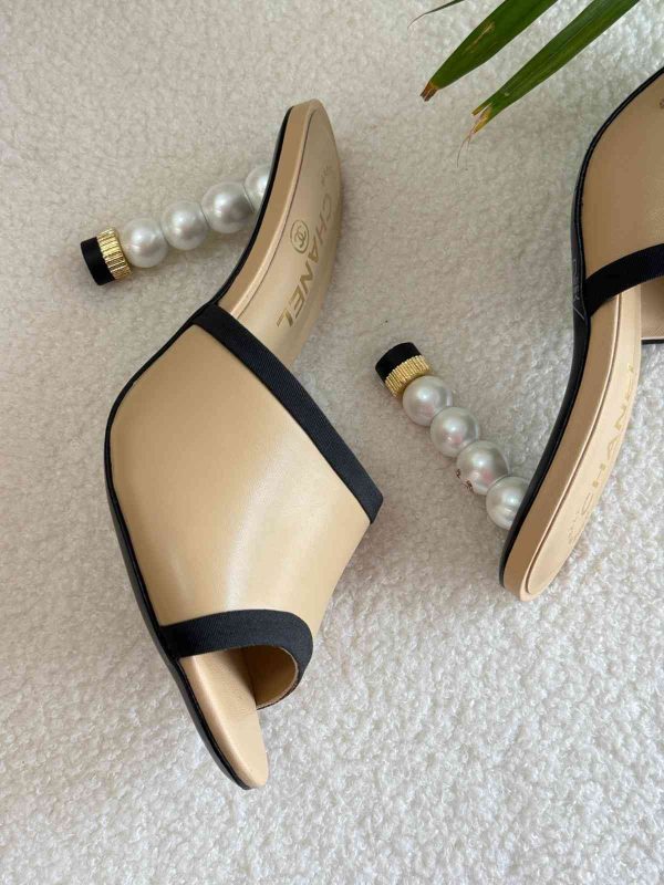 Chanel open toe pearl mules beige black