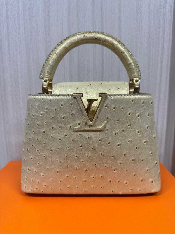 Luis vuitton ostrich capucines bag golden