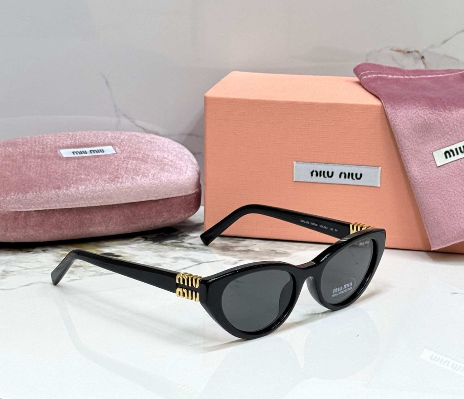 Miu Miu MU A04S cat eye sunglasses black