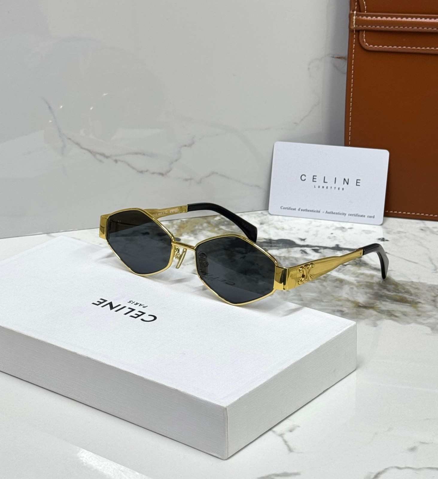 Celine women's hexagonal gold metal sunglass black
