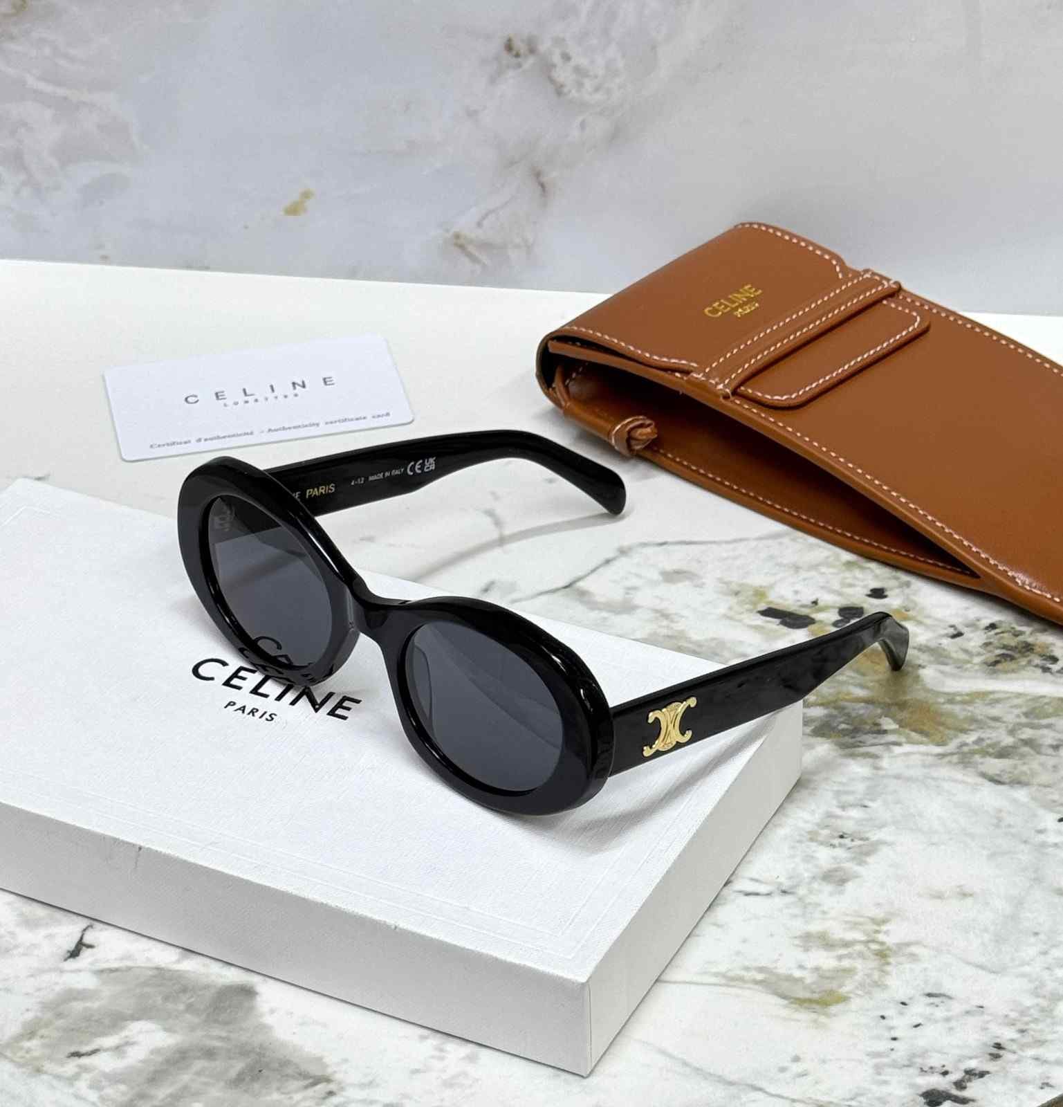 celine triomphe 01 oval sunglasses black