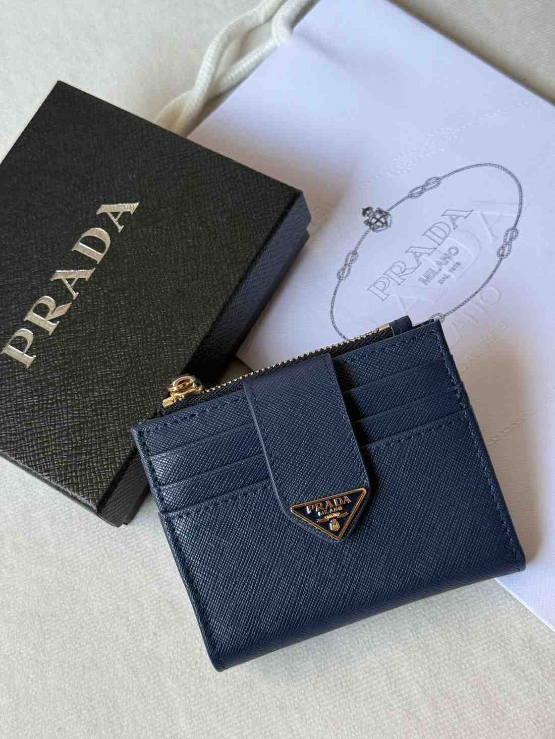 Prada triangle snap leather wallet blue
