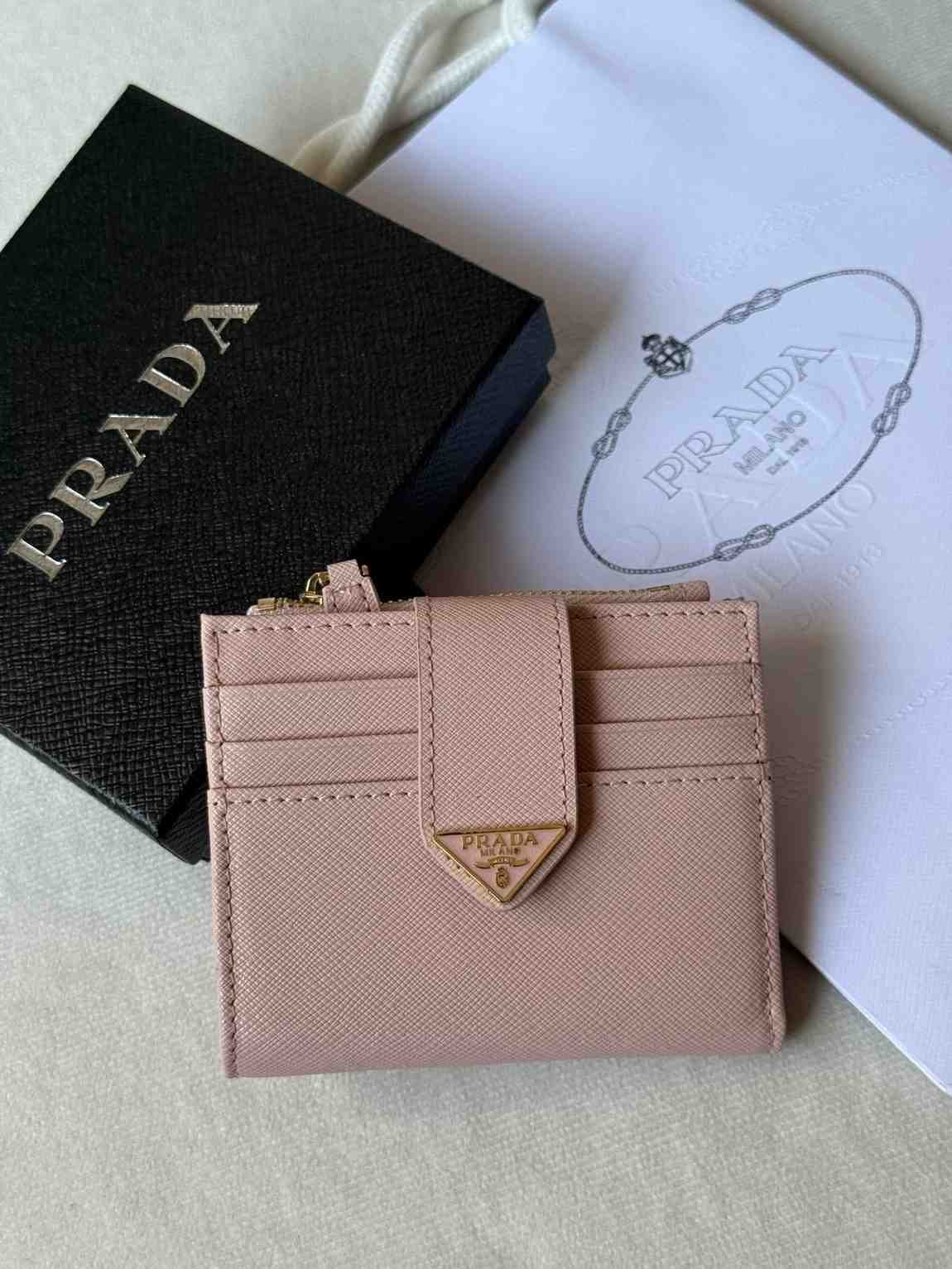 Prada triangle snap leather wallet baby pink