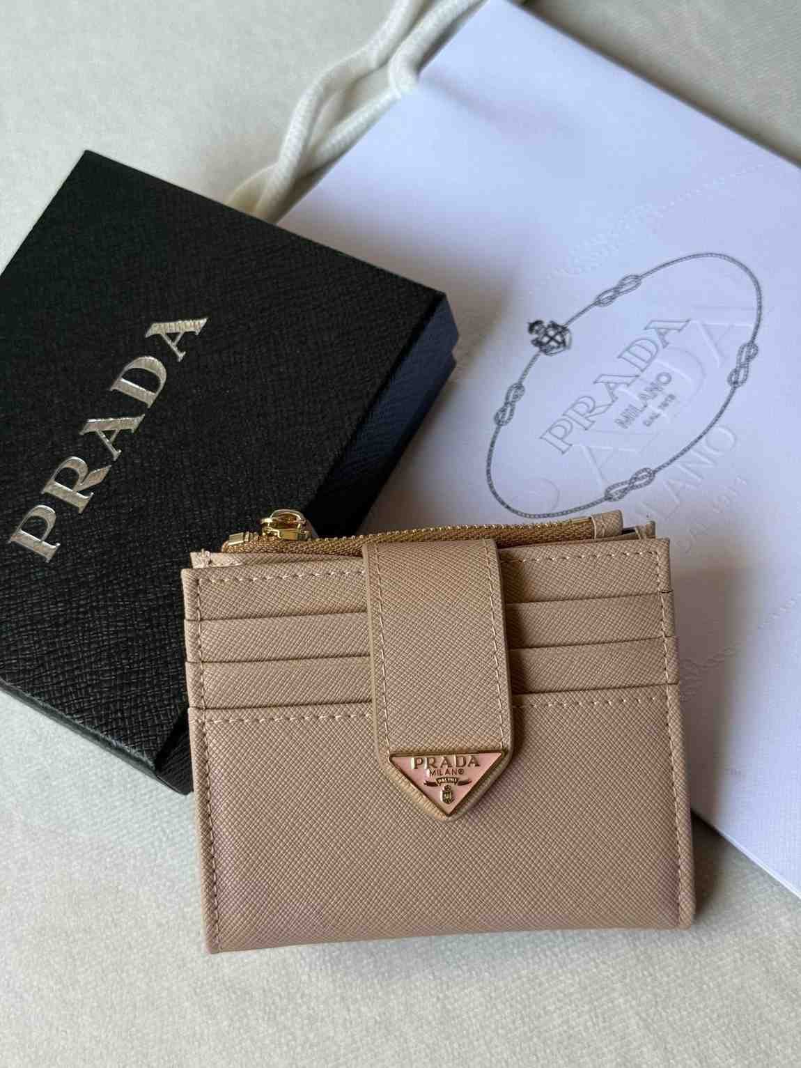 Prada triangle snap leather wallet beige