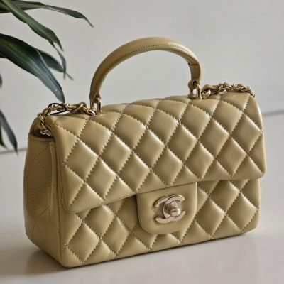 Chanel mini flap bag with top handle light yellow