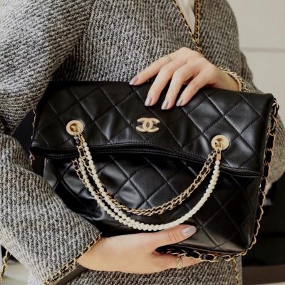 Chanel pearl strap fold over bag black
