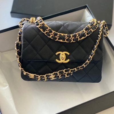 Chanel 22k coco first flap bag black