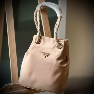 prada mariner re-nylon small bucket bag beige